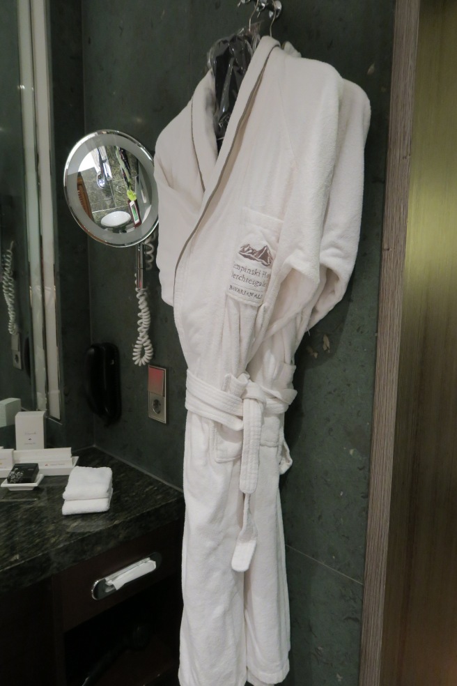 a white robe on a swinger