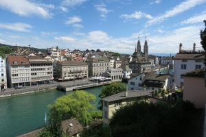 a city with a river and buildings