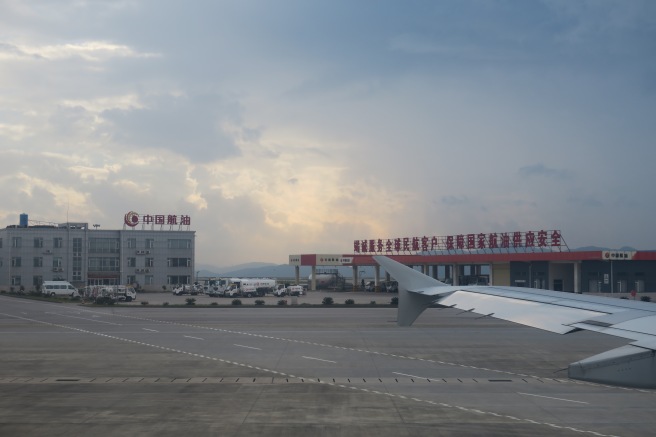 an airplane wing on a runway