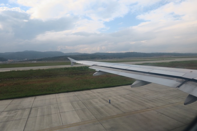 an airplane wing on a runway