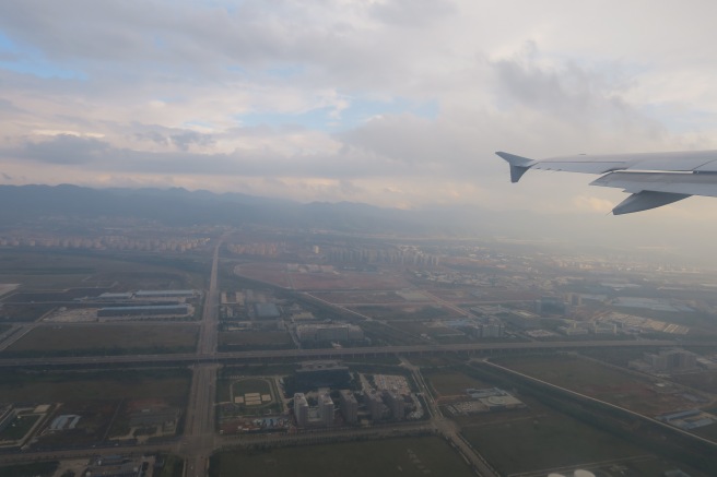 an airplane wing in the sky