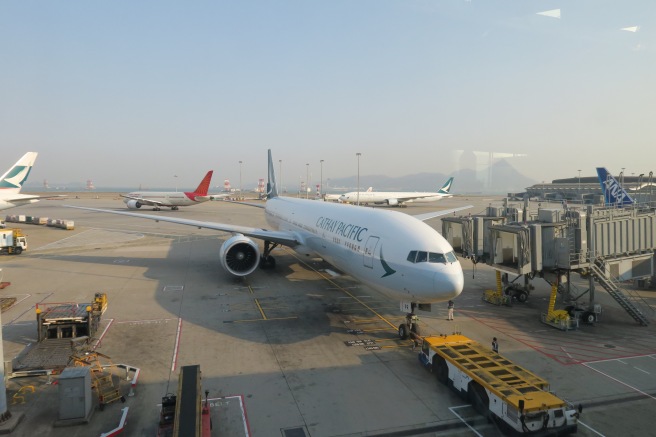 a large white airplane at an airport