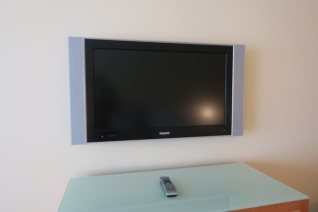 a tv mounted on a wall