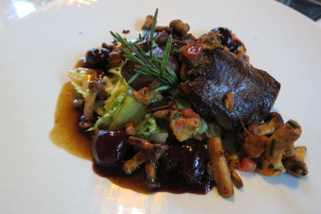 a plate of food on a white surface