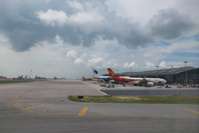 airplanes parked on a runway