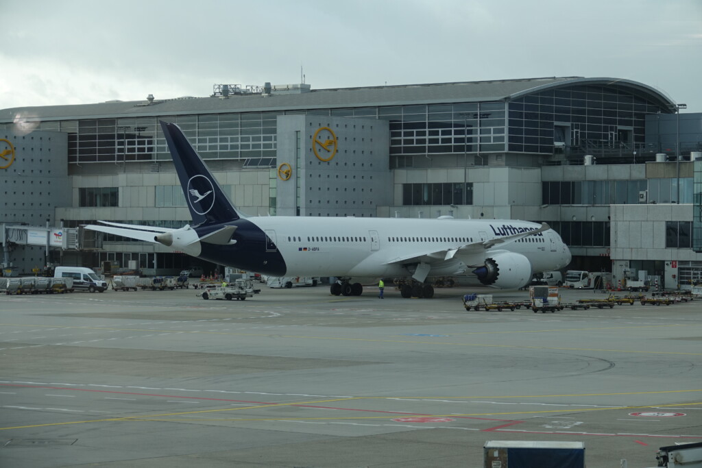 a large airplane parked in a terminal