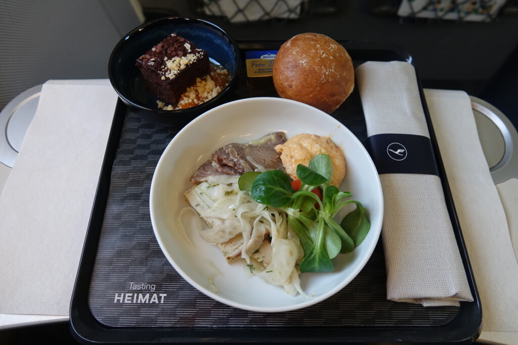 a plate of food on a tray