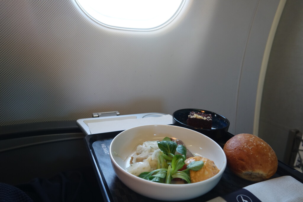 a bowl of food on a tray