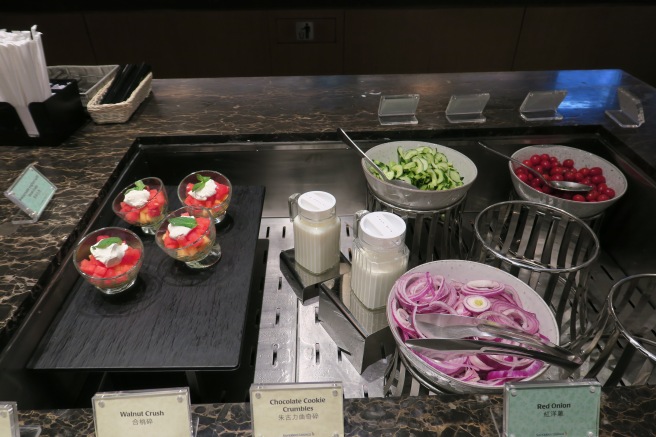 a buffet table with different food items