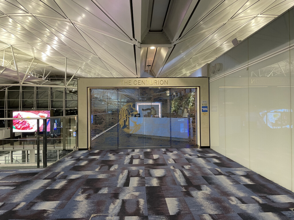 a hallway with a glass door