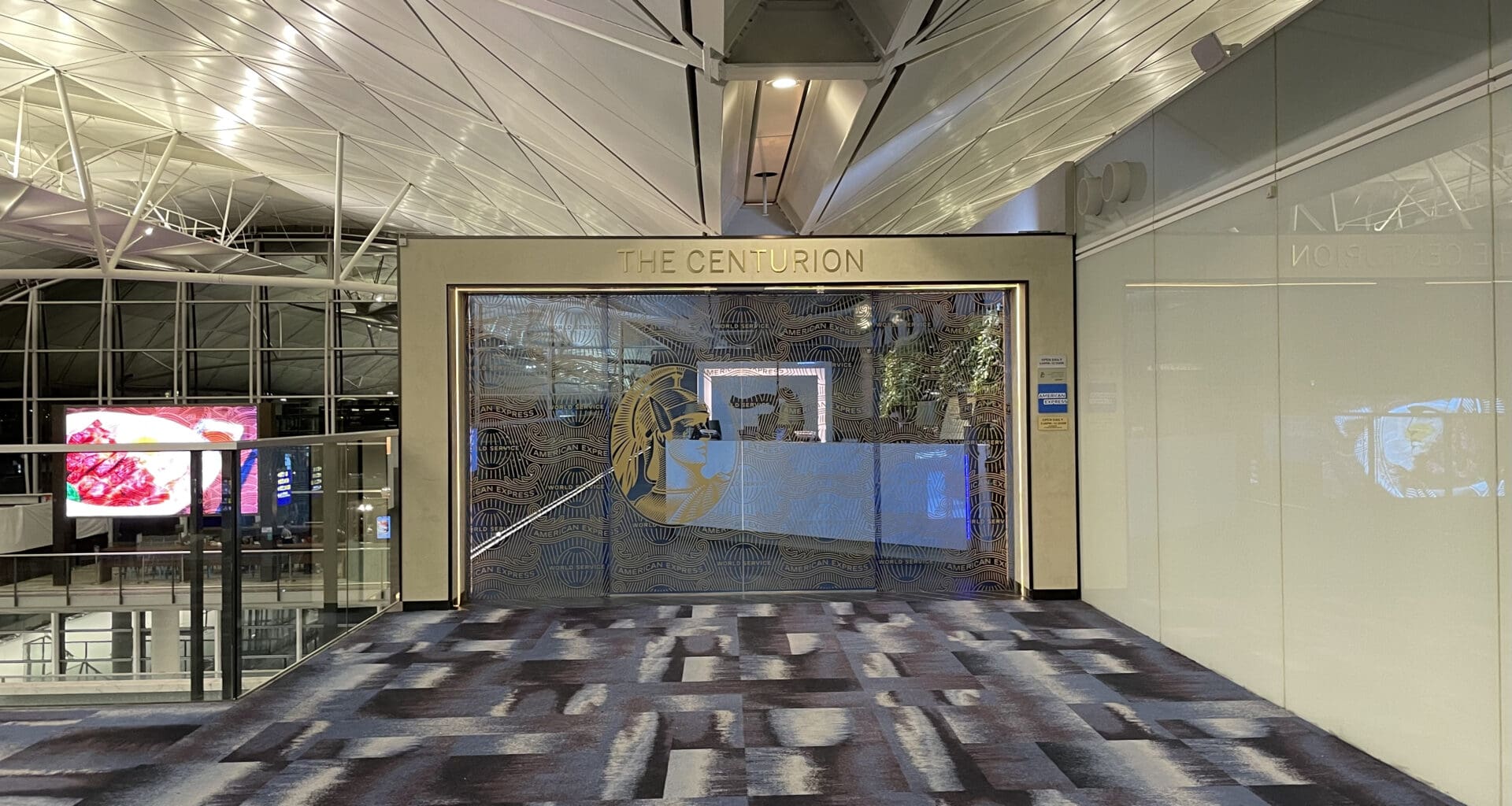 a hallway with a glass door