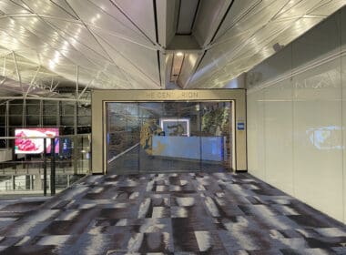 a hallway with a glass door