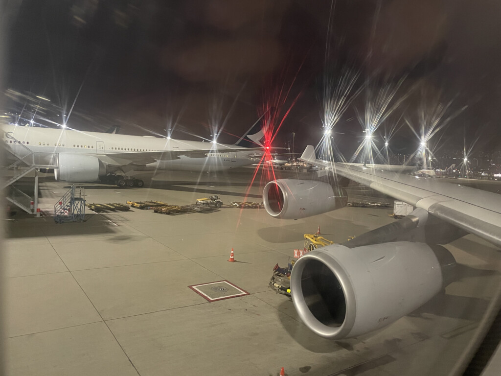 a large white airplane at night