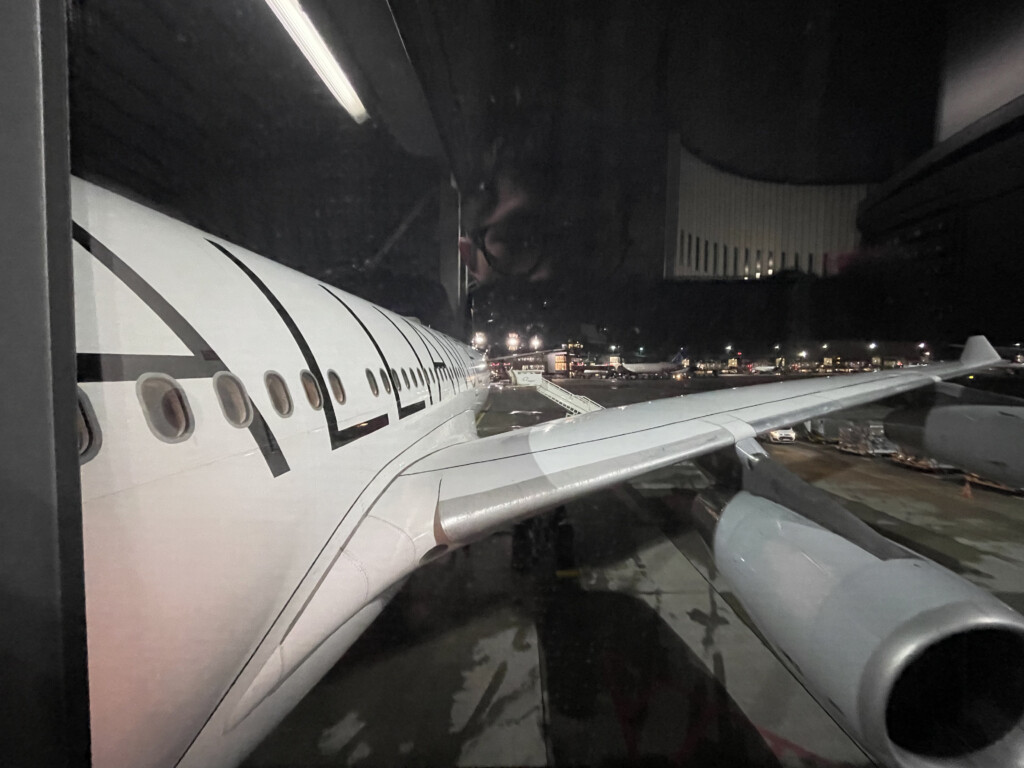 an airplane wing in a hangar