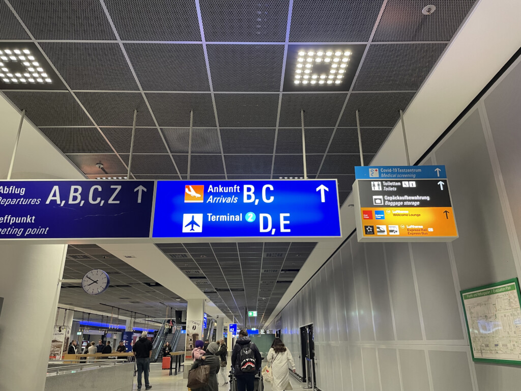 a group of people in an airport