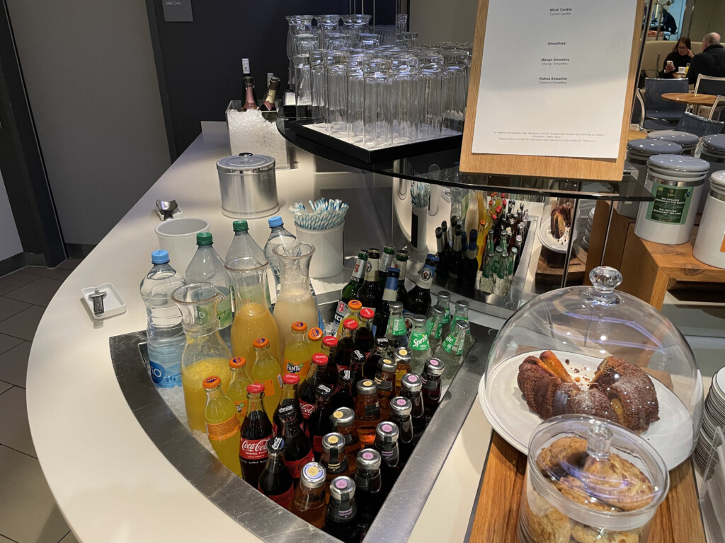 a table with drinks and glasses