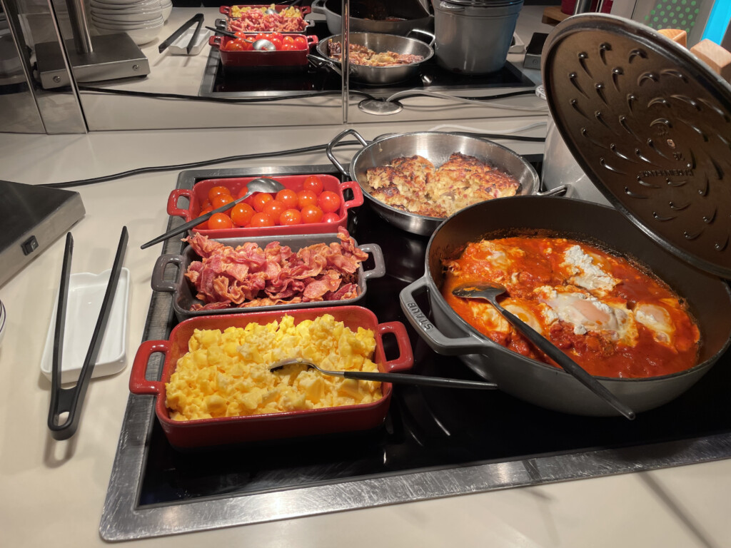 a group of pans with food in them