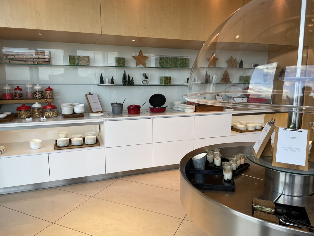 a kitchen with a circular glass dome