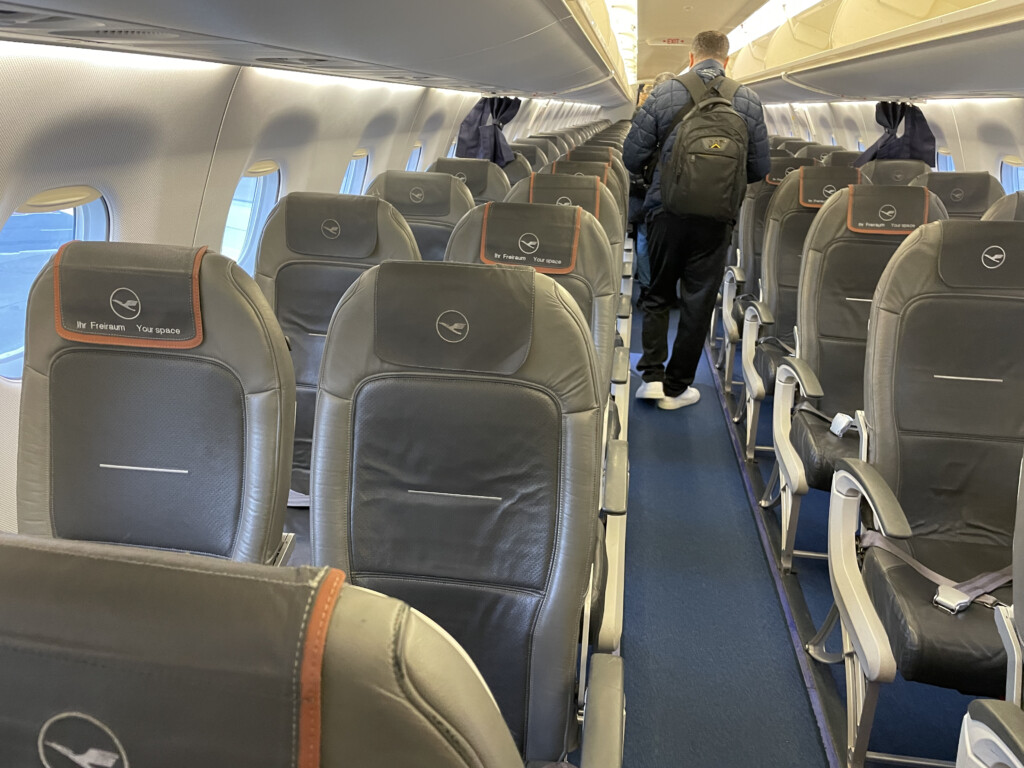 a man walking on an airplane