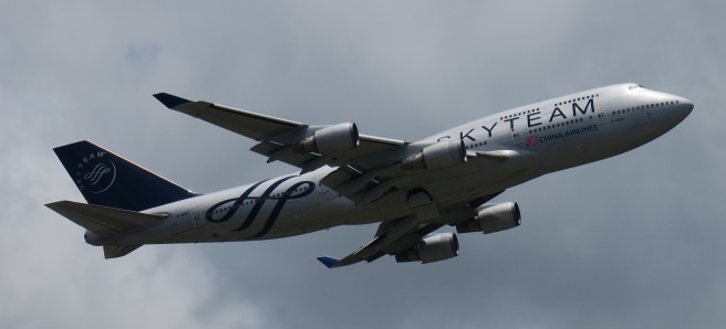 a large airplane flying in the sky