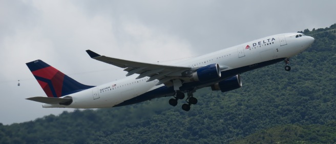 a large airplane flying in the sky