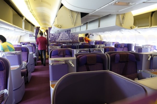 a plane with purple seats