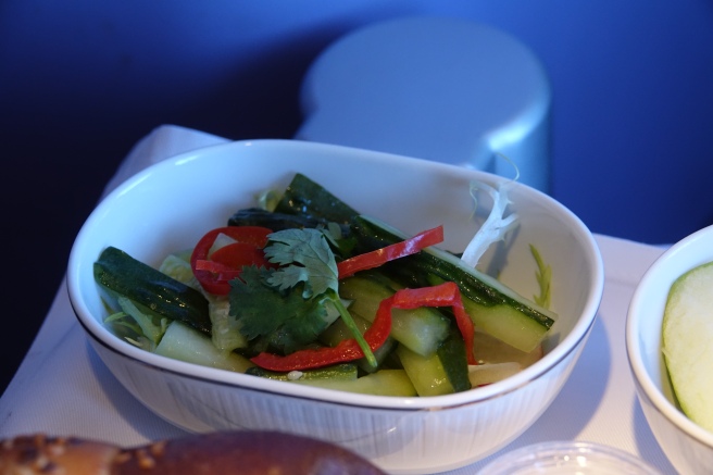 a bowl of salad on a table