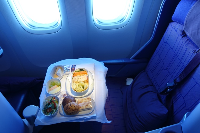 food on a tray in a plane