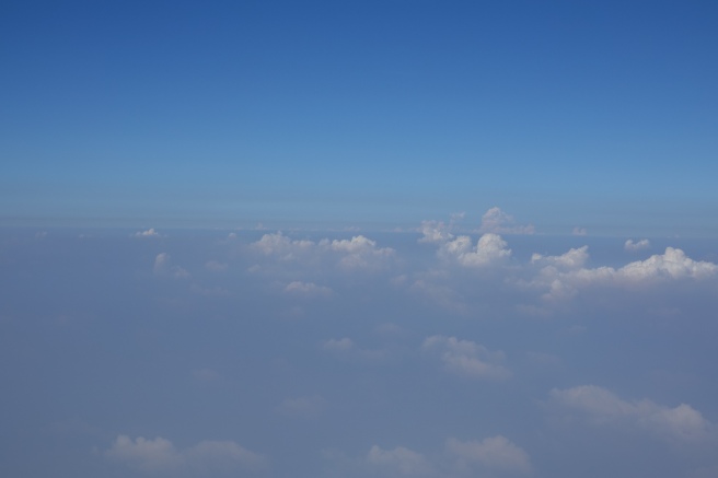 clouds and blue sky above clouds