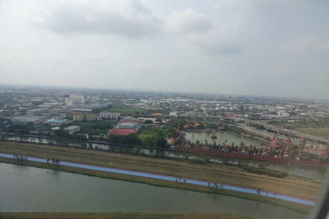 a city with a river and buildings