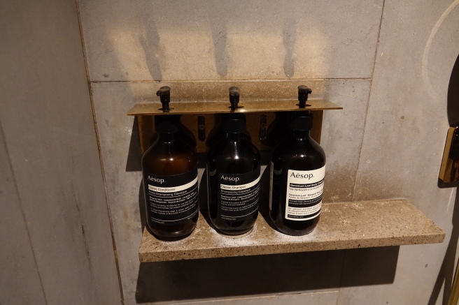 a group of bottles on a shelf