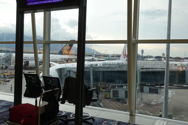 a group of airplanes in an airport