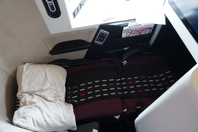 a bed in a plane