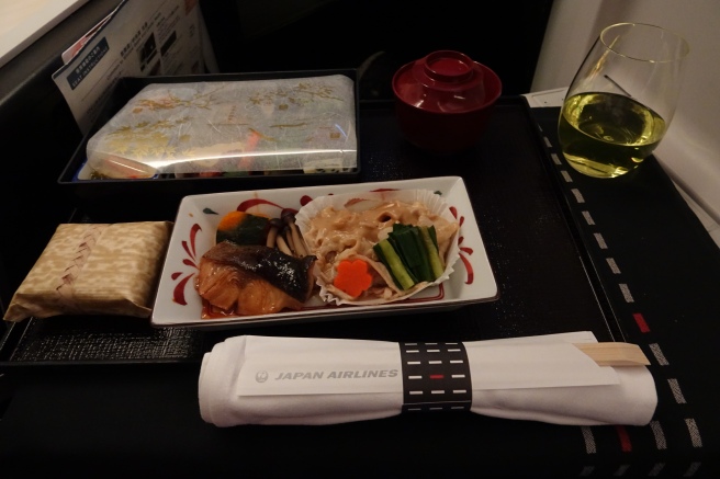 a plate of food on a tray