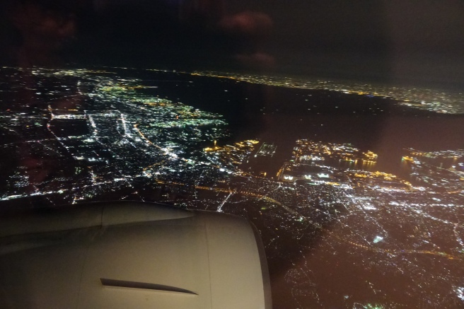 an aerial view of a city at night