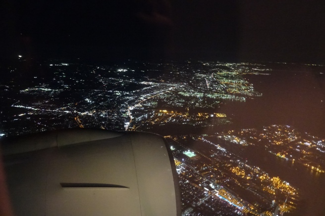 an aerial view of a city at night