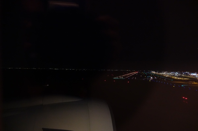 a view of a city from an airplane