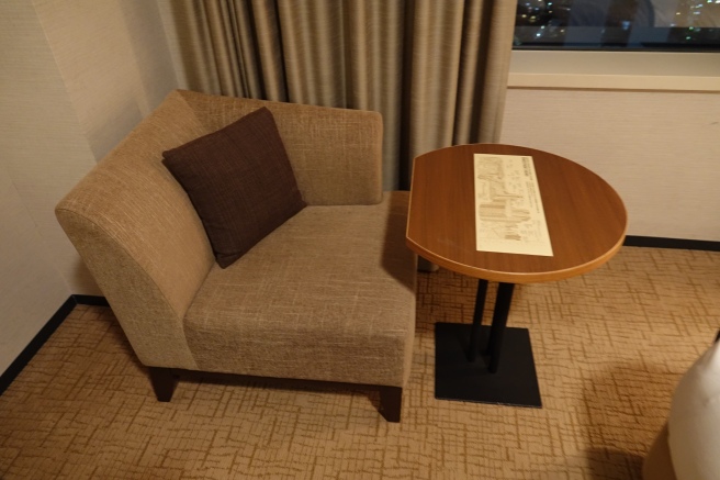 a chair and a table in a room