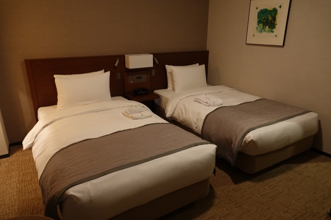 two beds in a hotel room