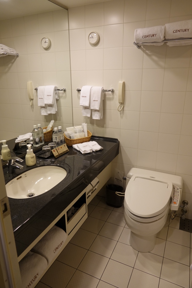 a bathroom with a sink and toilet