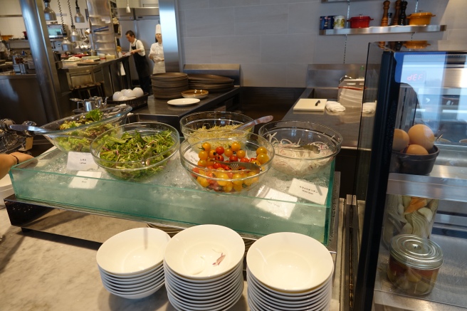 a kitchen with bowls of food