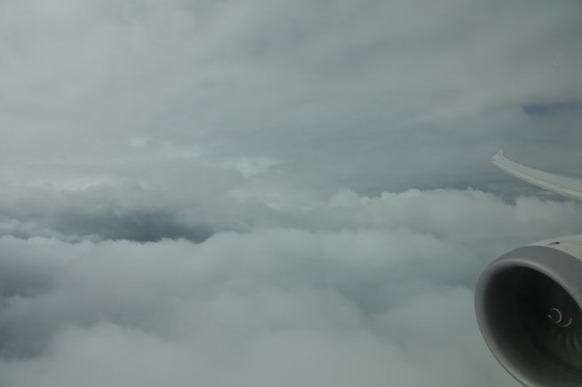 a view of clouds from an airplane window