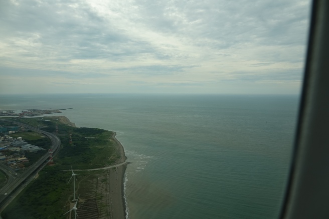 a road next to the ocean