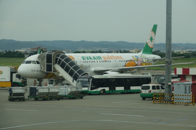 a passenger plane with a staircase on the side