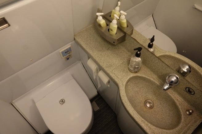 a sink and toilet in a bathroom