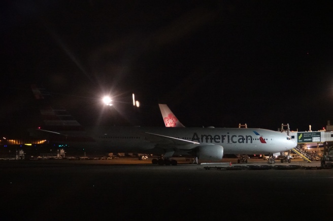 an airplane at night with lights