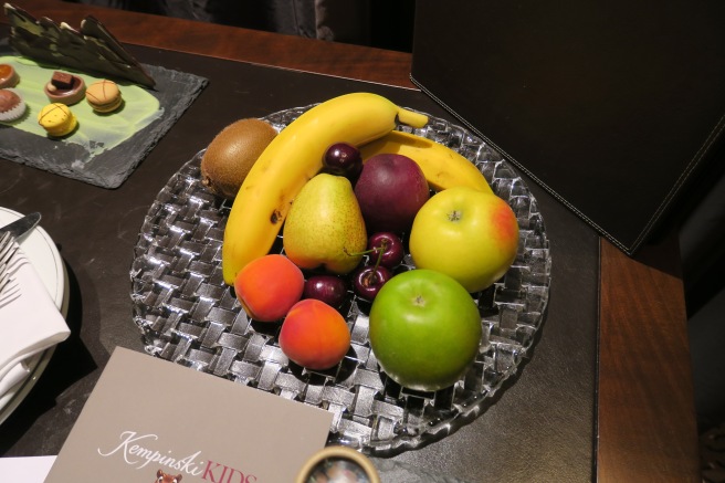 a plate of fruit on a table