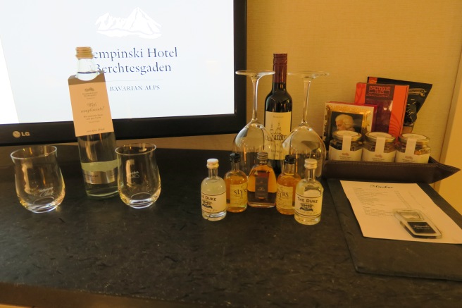 a group of bottles and glasses on a table