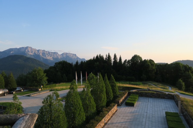 a landscape with trees and mountains