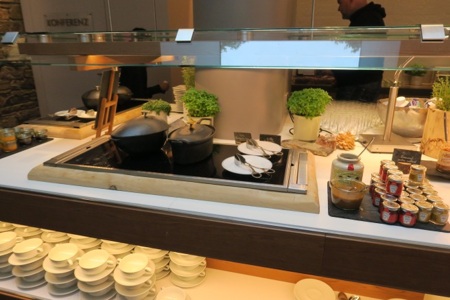 a kitchen counter with pots and pans